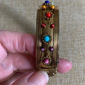 Colorful gold tone and faux gemstone cuff bracelet. Excellent condition.